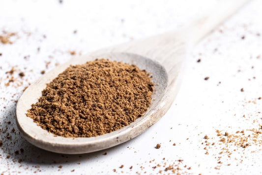 hing benefits for female health; asafoetida on a spoon